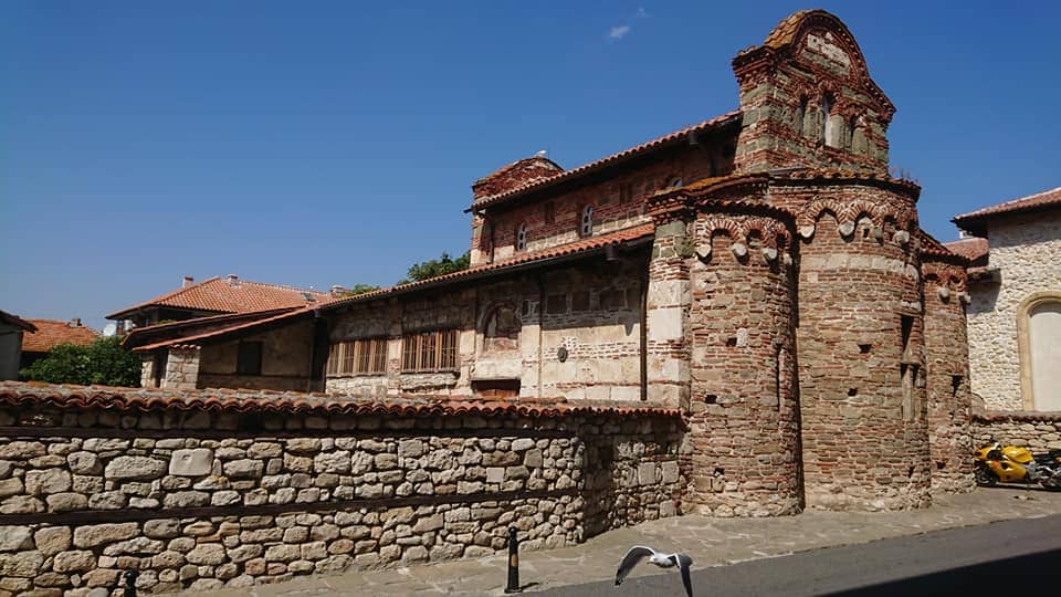 The brick-and-stone exterior of St. Stephen Church in Nessebar